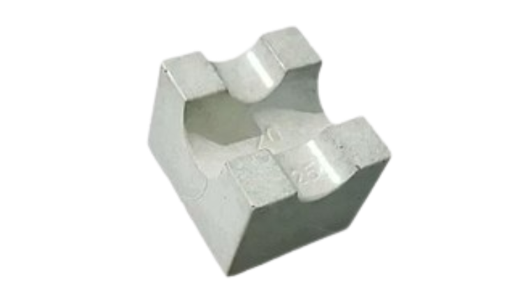 Concrete cover block for reinforcement support.
